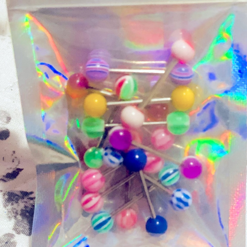 LOT OF 13 TONGUE RINGS